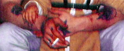 Tattoos on David Burrell's Left arm.  Photograph taken about 1972.